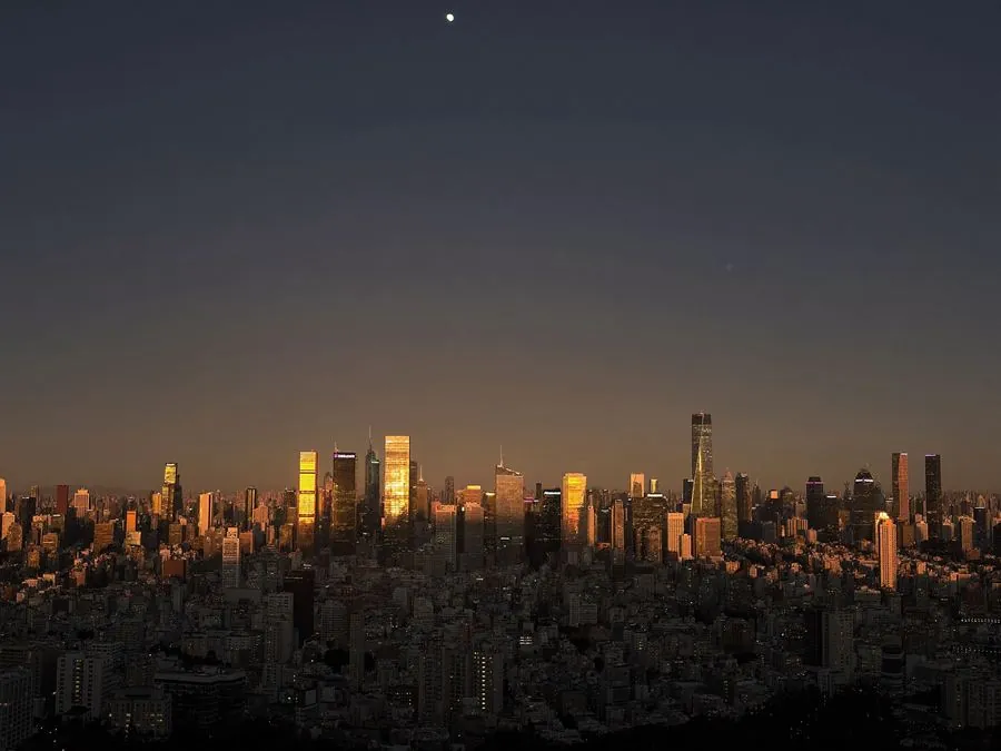 Golden hour over a global city skyline